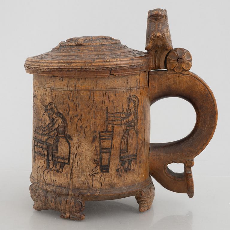 A Norwegian burr-birch tankard, circa 1800.