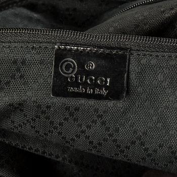 A bag by GUCCI.