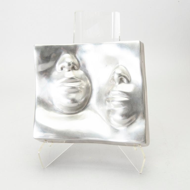 An Barbro Bäckström relief in aluminium. Signed and dated 60/75 1972.