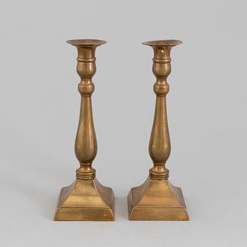 A PAIR OF BRONZE CANDLESTICKS, 19th century.