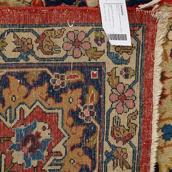 A CARPET, a semi-antique Tabriz, ca 342 x 269 cm.