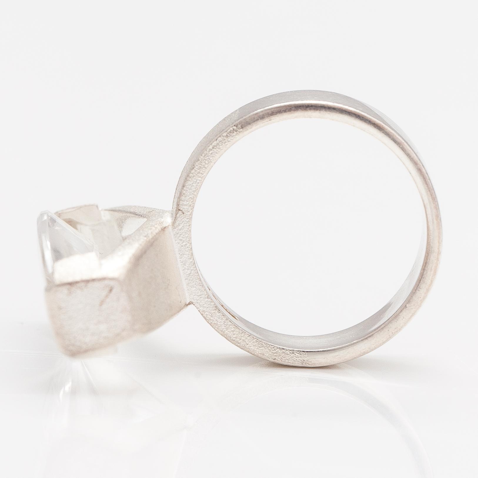 Björn Weckström, A sterling silver ring "Luminoso" with a munsteiner cut rock crystal. Lapponia 2009.