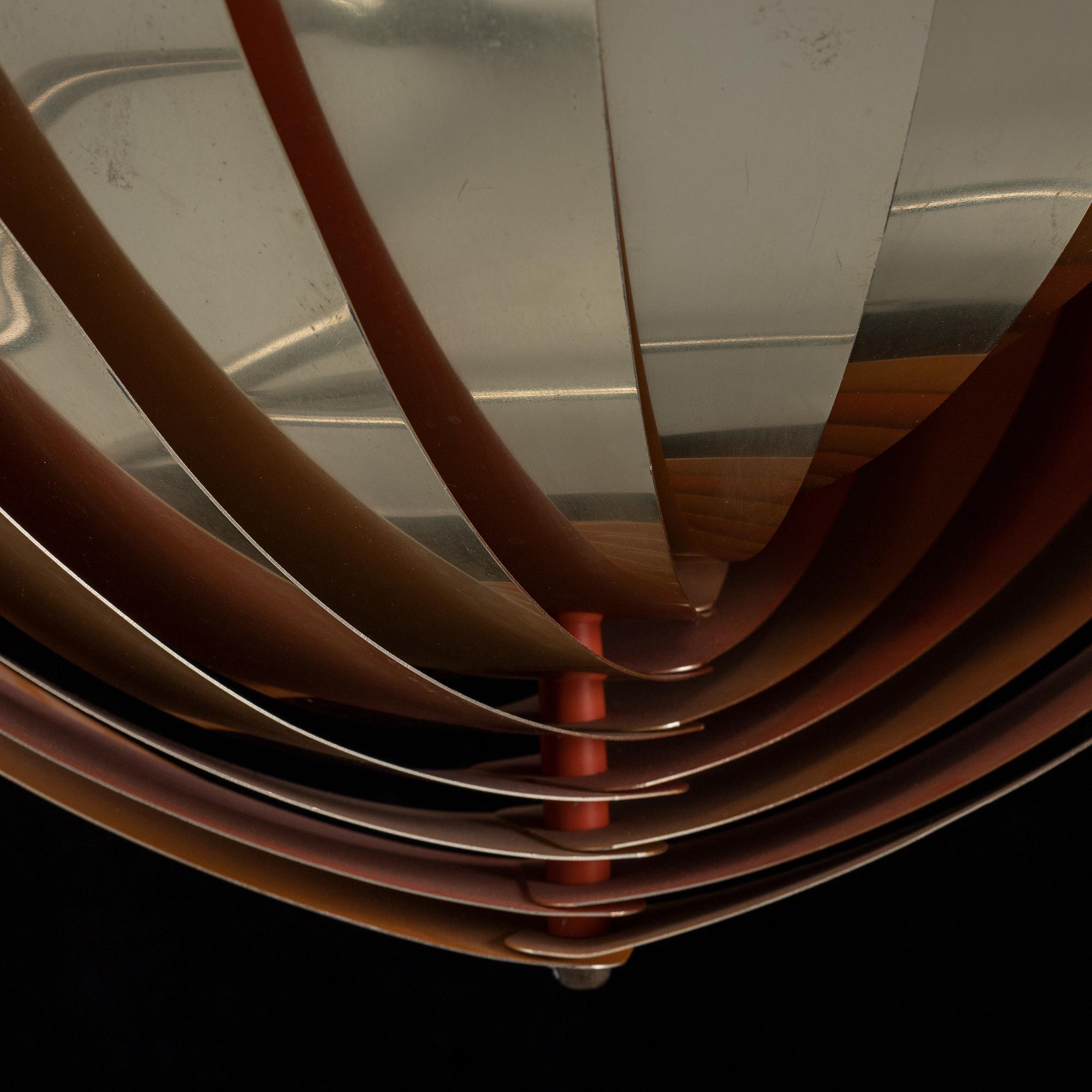 A 'Konkylie' ceiling light by Louis Weisdorf.