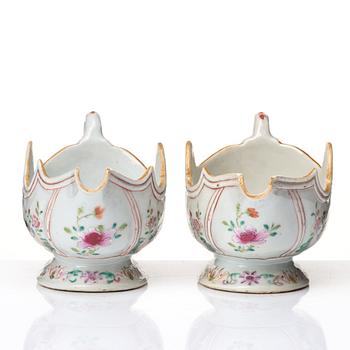 A pair of famille rose 'double peacock sauce boats, Qing dynasty, Qianlong (1736-95).