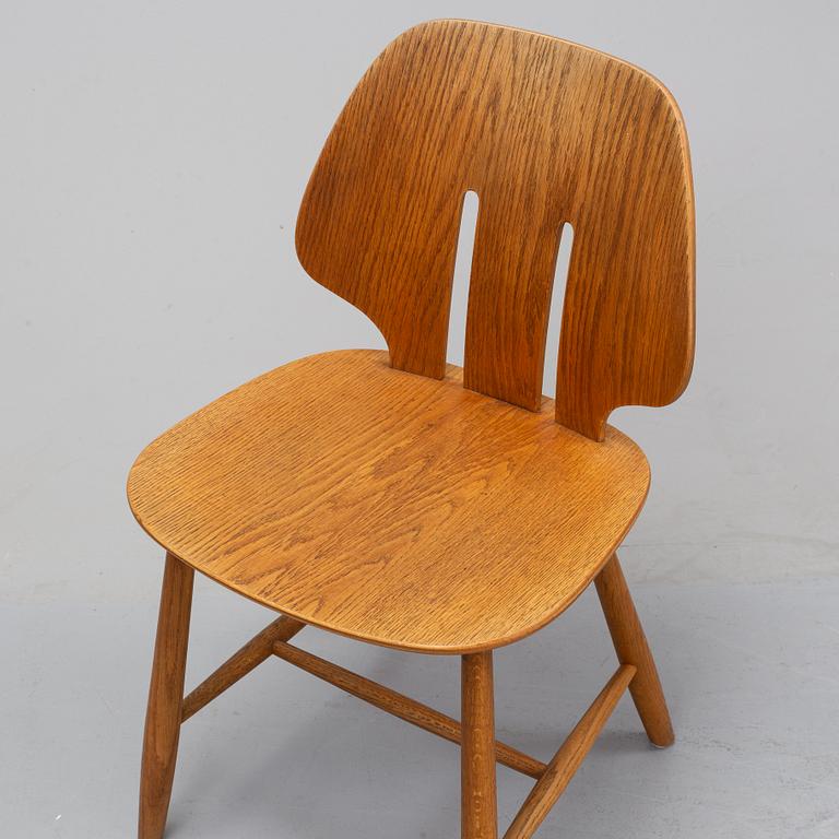 Three 'J 67' oak chairs by Ejvind A. Johansson, 1960's.