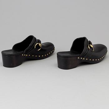 CLOGS by Gucci, size 40.