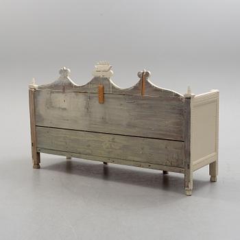 A painted pine sofa, 19th Century.
