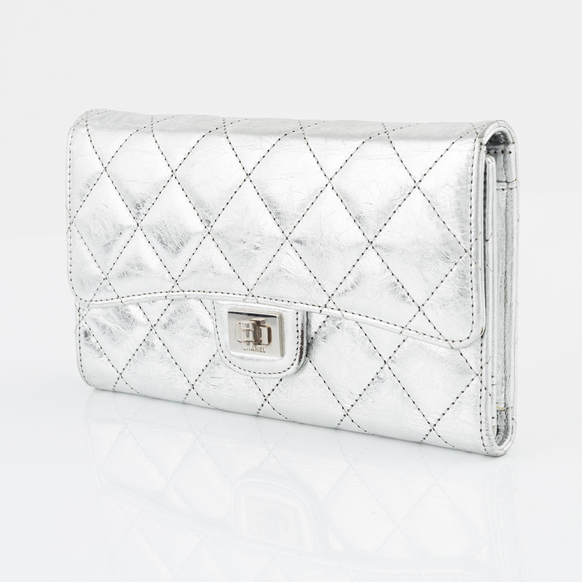 Chanel, a quilted silver leather wallet, 2006-08.
