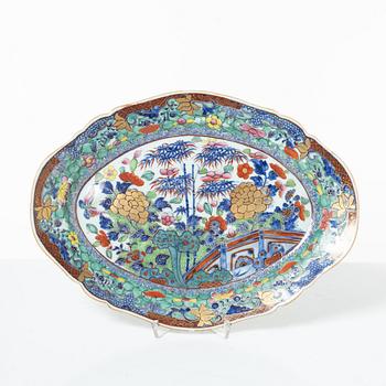 Two Chinese blue and white porcelain dishes and a small dish, Qing dynasty, 18th century.