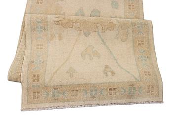 An Ushak runner carpet, c. 360 x 80 cm.