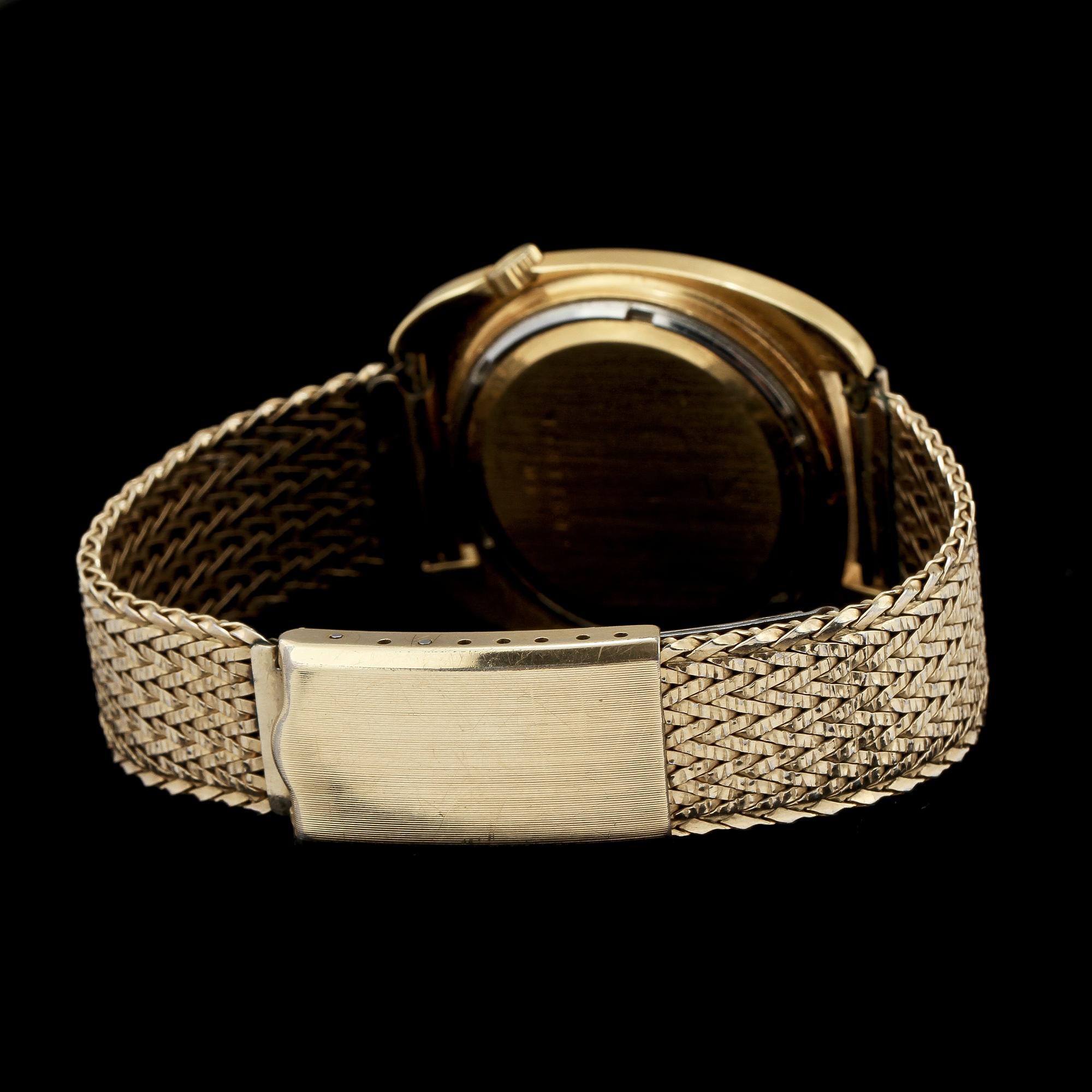 HERRARMBANDSUR, 18k guld stål, Bulova, Accutron, 1900-tal. Vikt 73 g.