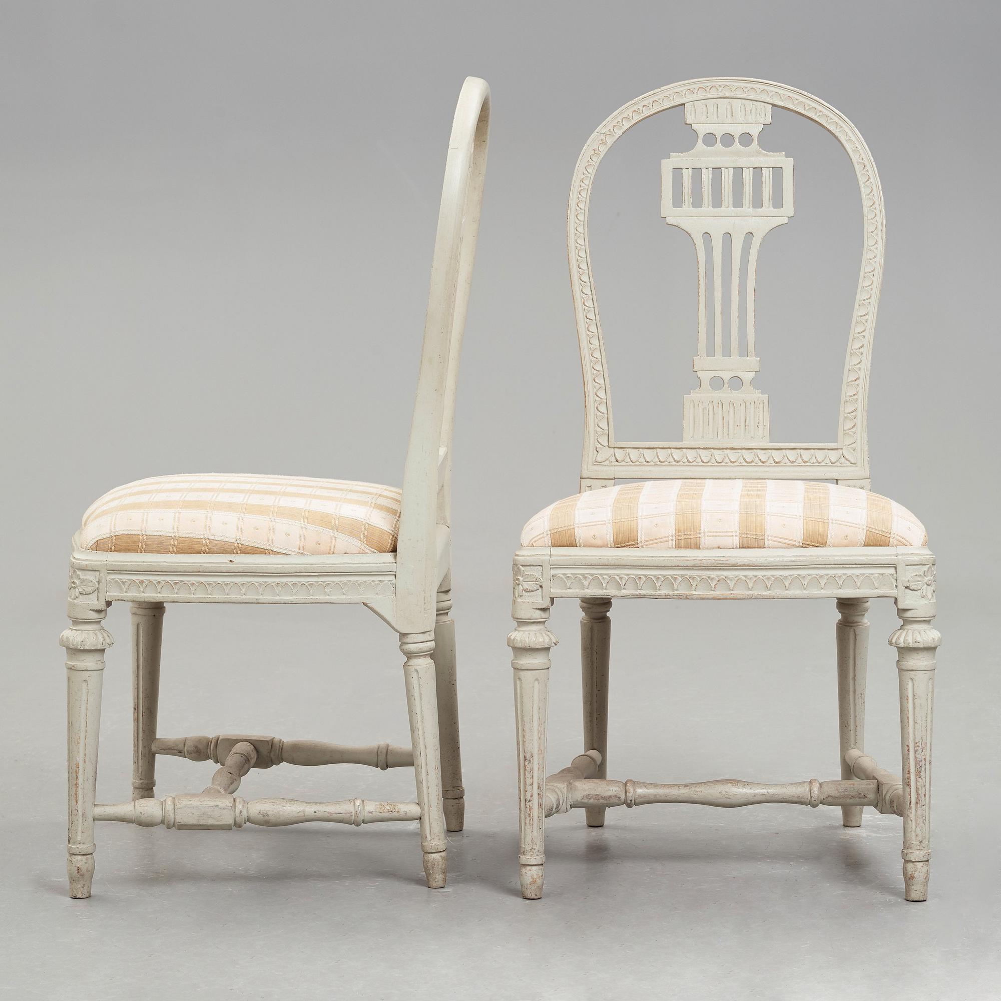 A pair of late Gustavian late 18th century chairs.