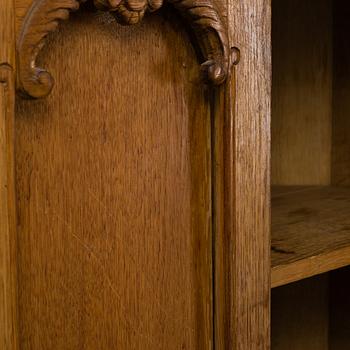 KNUT FJAESTAD, a folk art oak cabinet, signed KF 1935.
