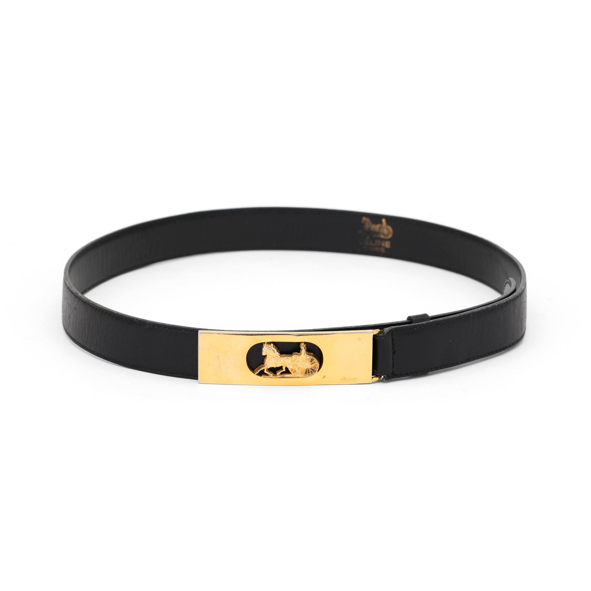 CÉLINE, a black leather belt.