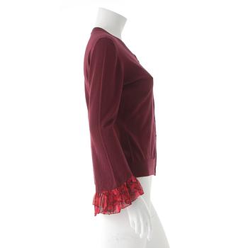 BURBERRY, a burgundy red merino wool cardigan.