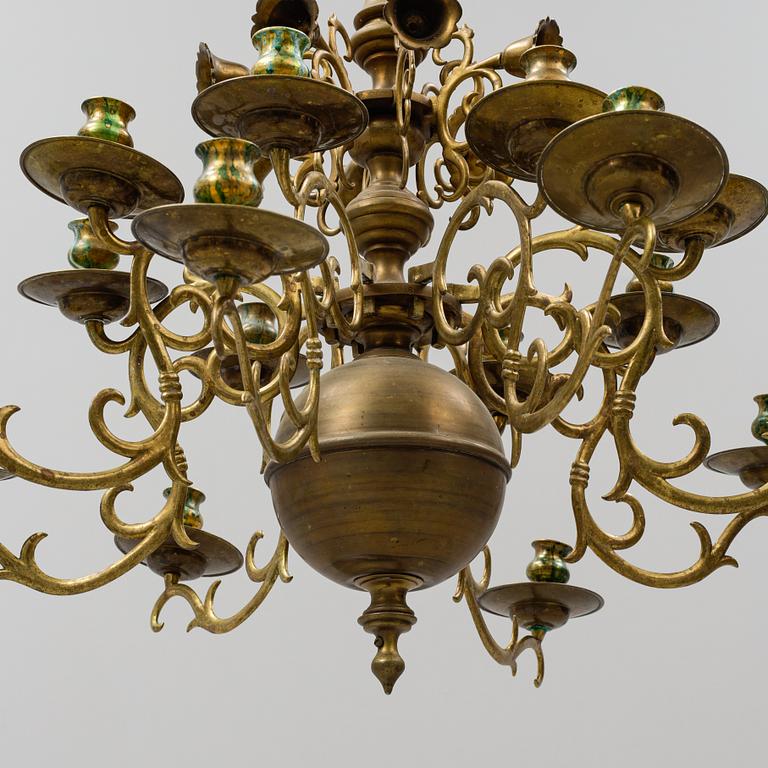 A brass Baroque style chandelier. 20th Century.