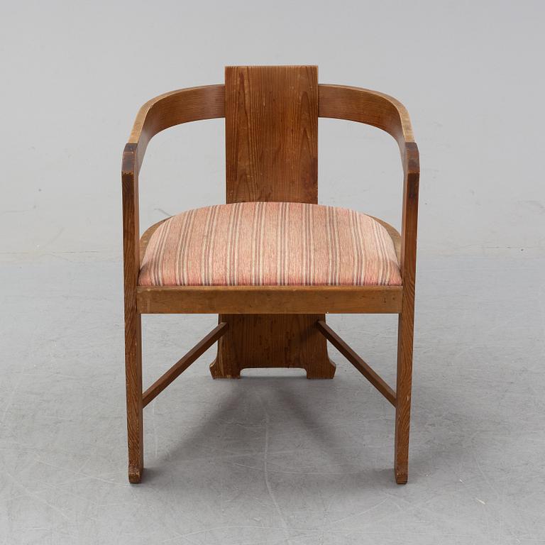 A pine armchair attributed to Carl Westman early 20th Century.