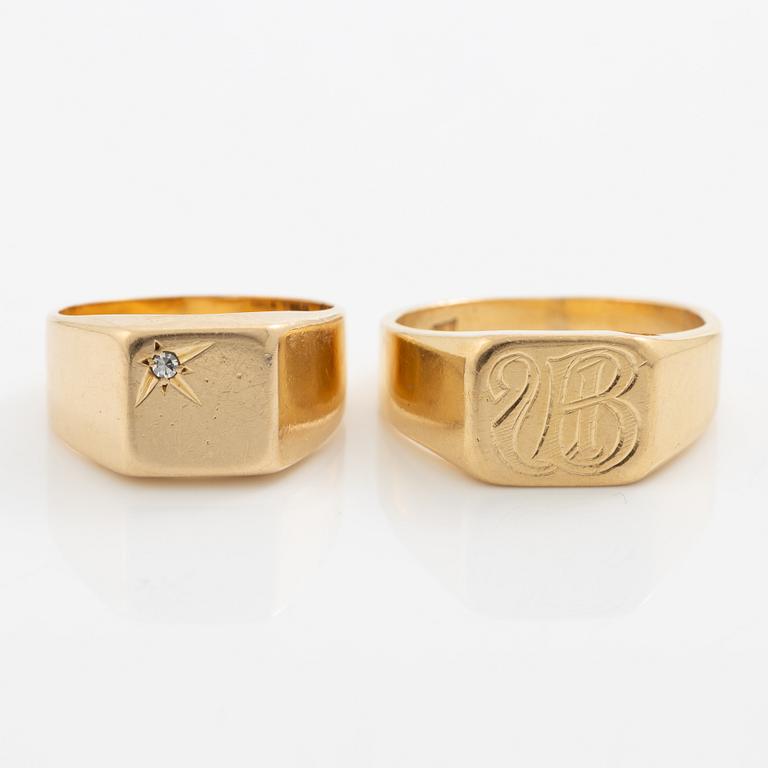 Two rings 18K gold.