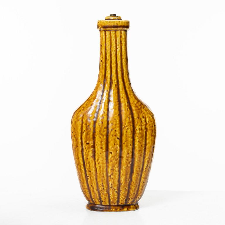 Gunnar Nylund, a set of three chamotte stoneware vases and a lamp base, Rörstrand 1930s-40s.