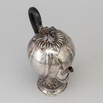 A bulbous silver coffeepot maker's mark Charles Stuart Harris, London, 1893.