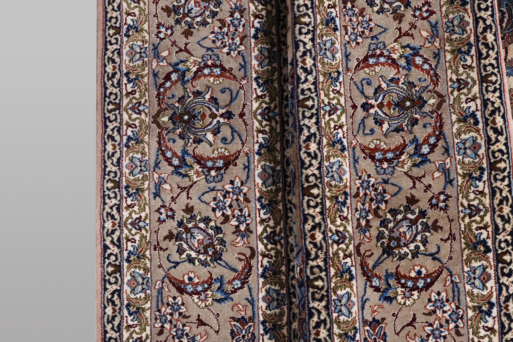 A rug, Esfahan, part silk, ca 245 x 155 cm.