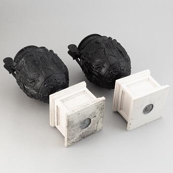 A pair of basalt ware volute vases, 19th century.