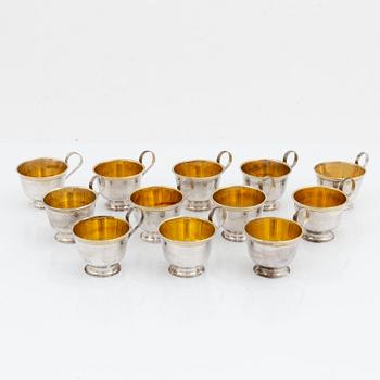 Twelve parcel gilt silver mugs, Johanna Gottschalk, Arkala, Stockholm, 1962-68.