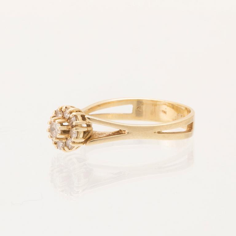 An 18K yellow gold Carmosé ring set with round brilliant-cut diamonds.