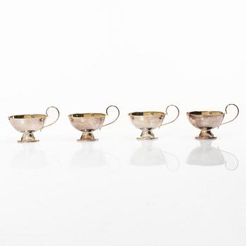 Sauceboat and four punch cups, silver, Sweden, 20th century.