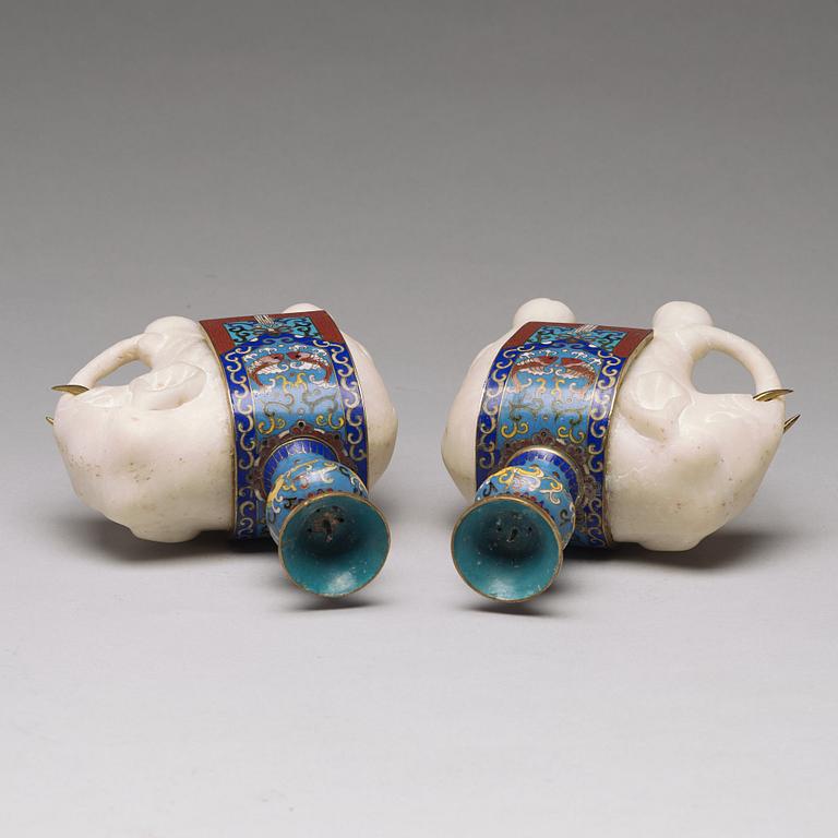 A pair of cloisonné and marble elephant candle holders, late Qing dynasty, about 1900.