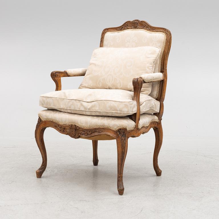 A French Louis XV chair, mid 18th Century.