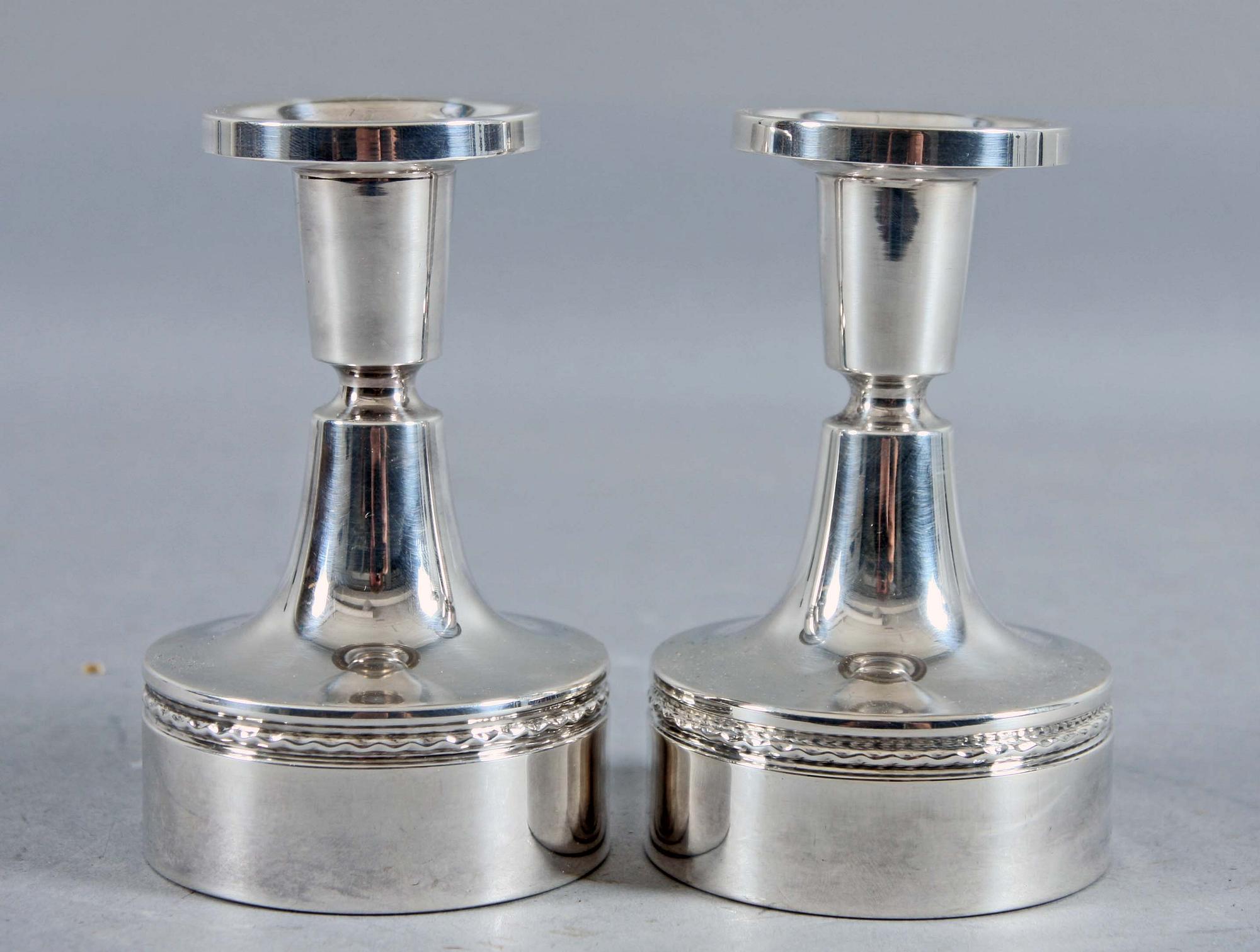 LJUSSTAKAR, ett par, silver, 1900-talets andra hälft.