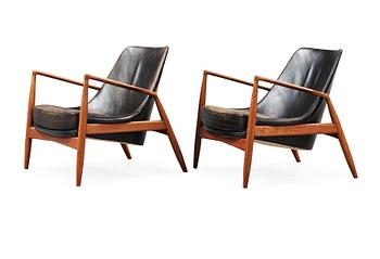 116. A pair of Olof Persson 'Seal' teak and black leather easy chairs, Olof Persson Möbler, Jönköping 1950's-60's.