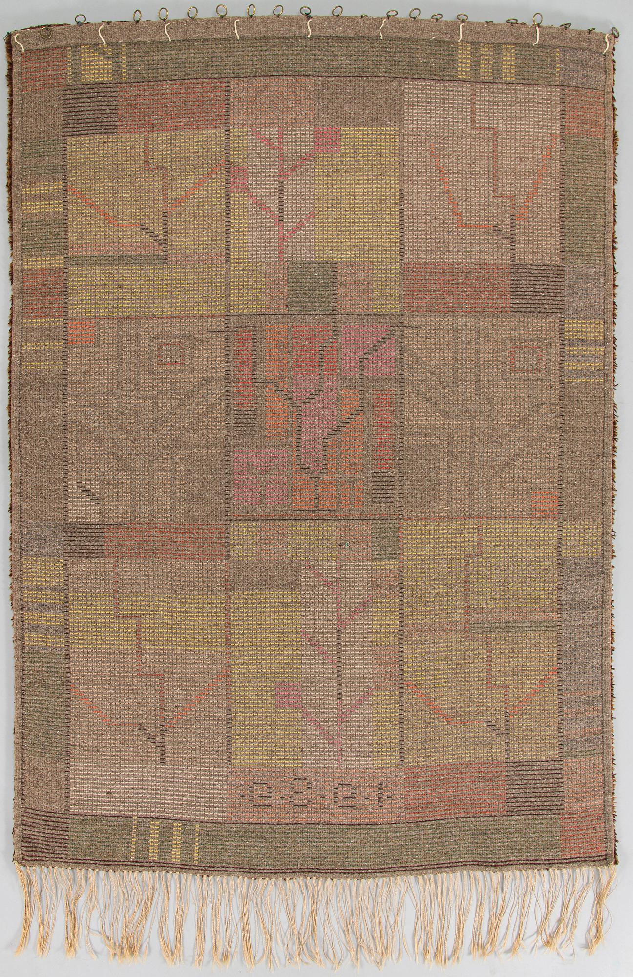 Impi Sotavalta, rya, modell för Finska handarbetets vänner, daterad 1939. Ca  165 x 120 cm.