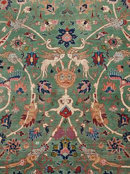 A carpet, a semi-antique Tabriz, ca 374-376,5 x 268-276 cm.