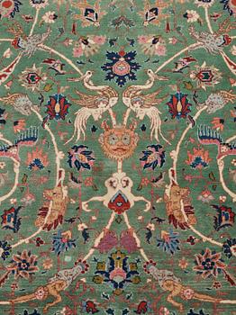 A carpet, a semi-antique Tabriz, ca 374-376,5 x 268-276 cm.