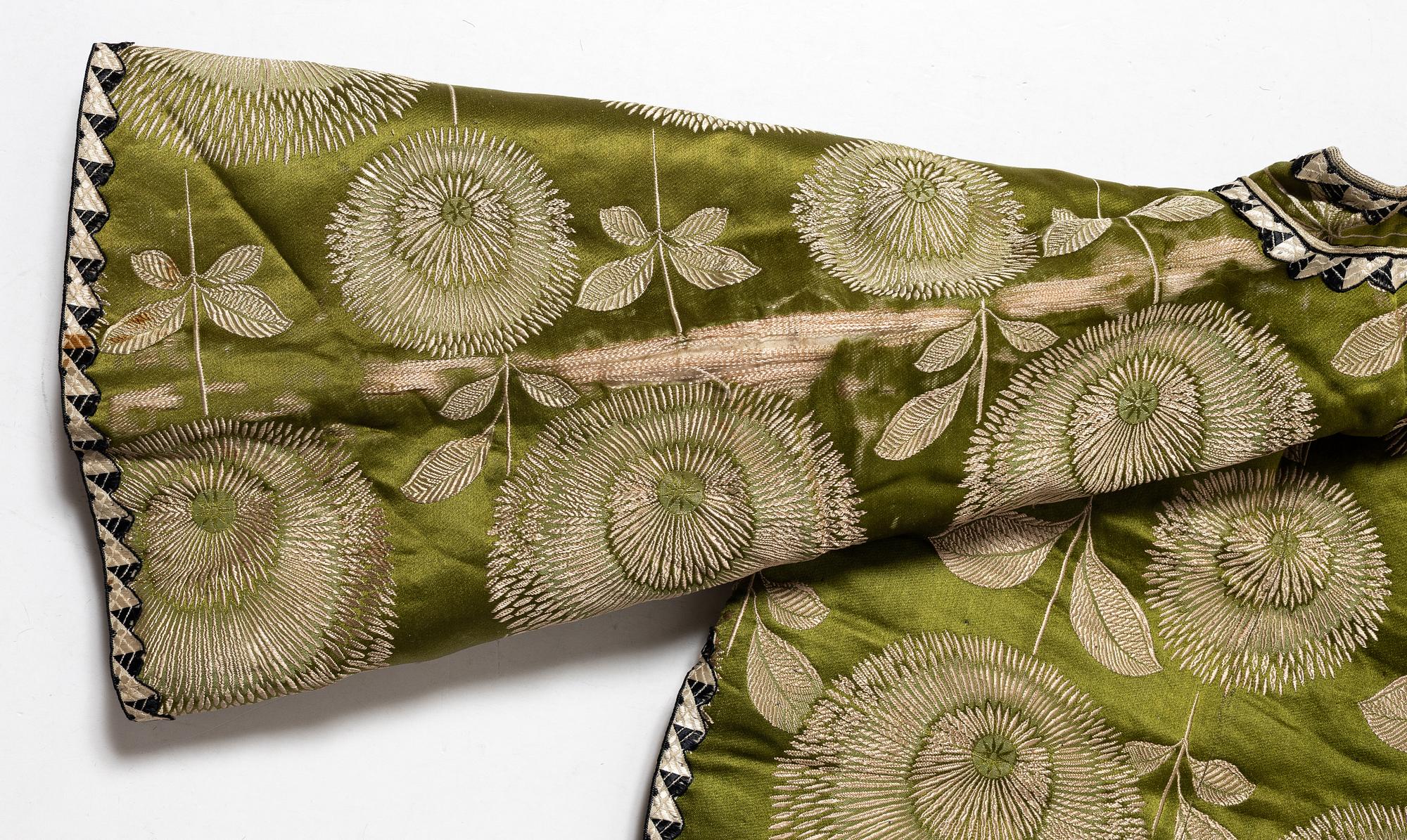 A Japanese silk brocade and fur childrens jacket, Meiji (1868-1912).