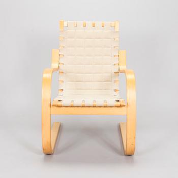 Alvar Aalto, a 1980s Artek 406 armchair.