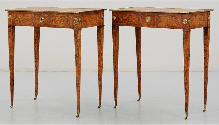 A pair of Gustavian tables signed by A. Lundelius and dated 1785.