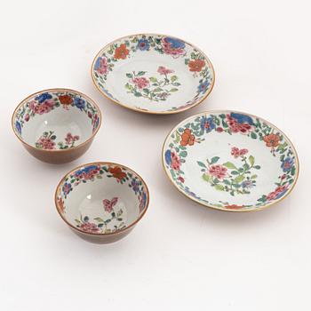 A group of five famille rose cups with saucers (2+2+1) and a saucer, Qing dynasty, Qianlong (1736-95).