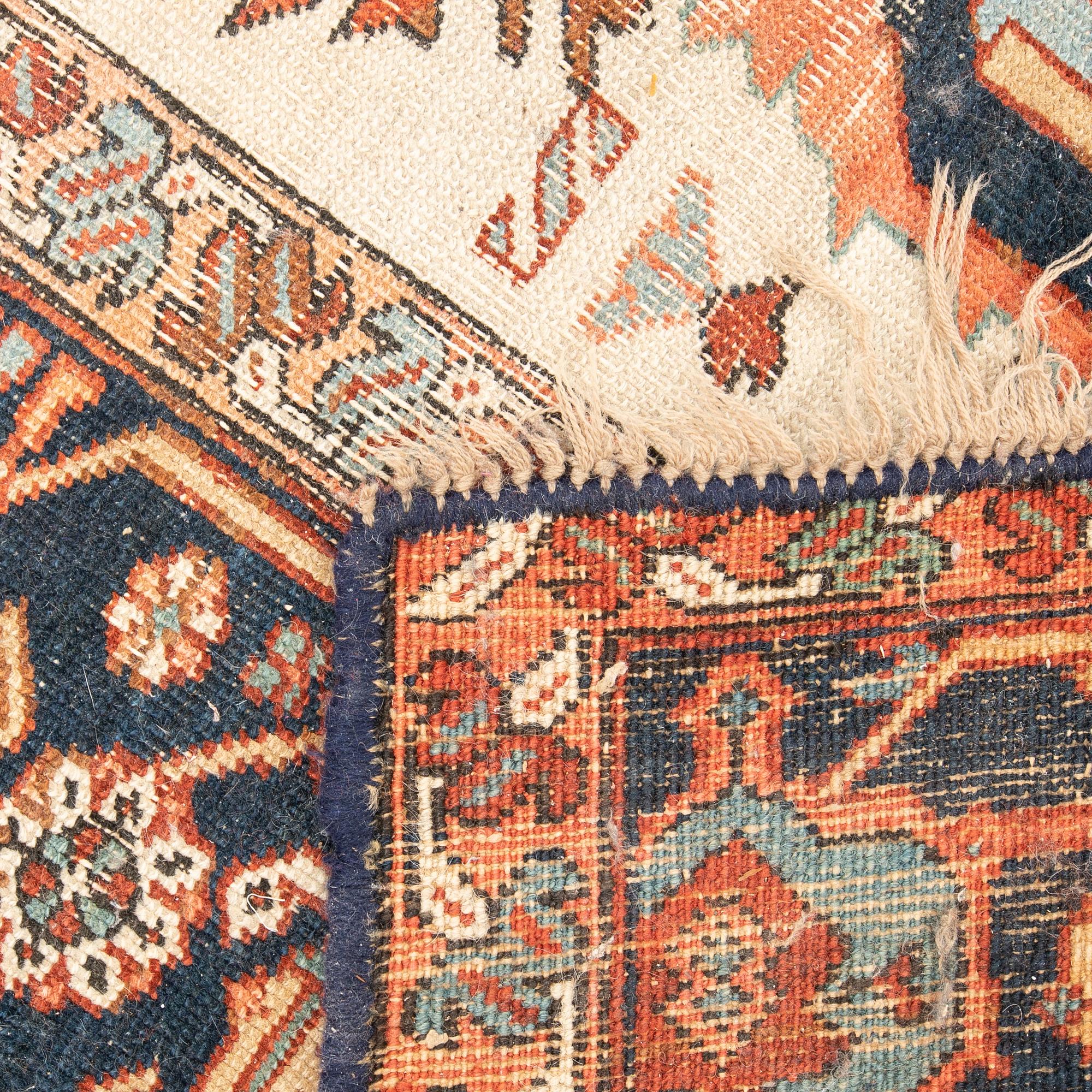 Heriz carpet semi-antique/antique approximately 384x300 cm.