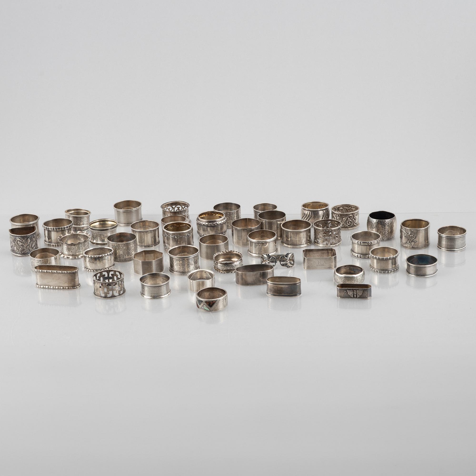 A collection of silver napkin rings, mostly England, Denmark (46 pieces).