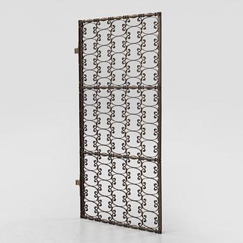 A brass gate, 20th century.