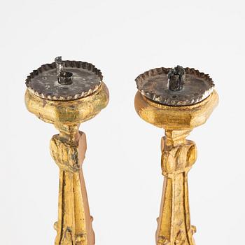 A pair of altar candle sticks, possibly southern Europe, 19th century.