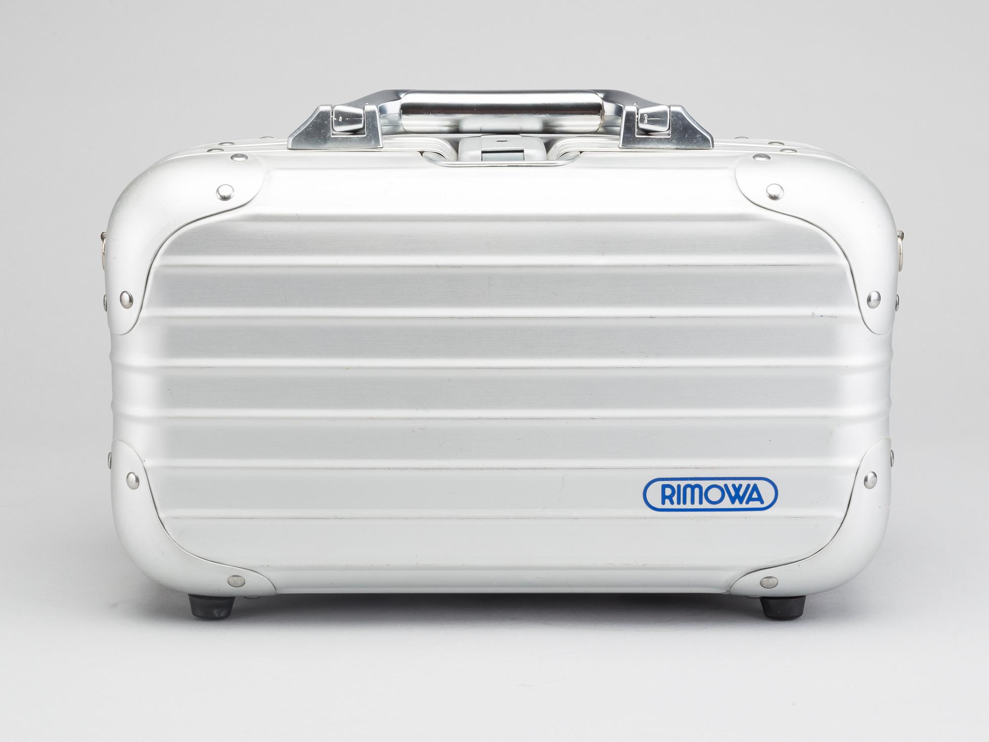 A set of three Rimowa bags later part of the 20th century.