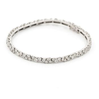 Bracelet 14K gold with round brilliant-cut diamonds.