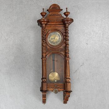 A Neo-Renaissance reugulator wall clock by Gustav Becker, late 19th Century.