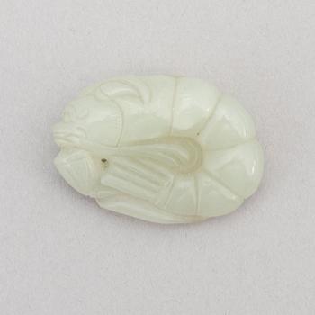 A Chinese nephrite figure in the shape of a shrimp, presumably around the year 1900.