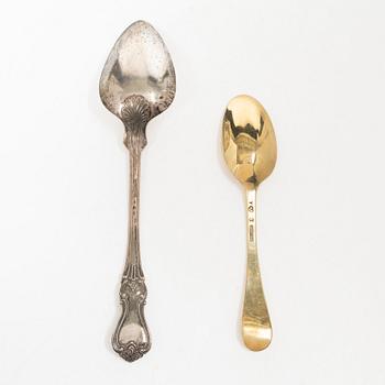 A Swedish silver gilt spoon, and a silver serving spoon, 18-19th Century.