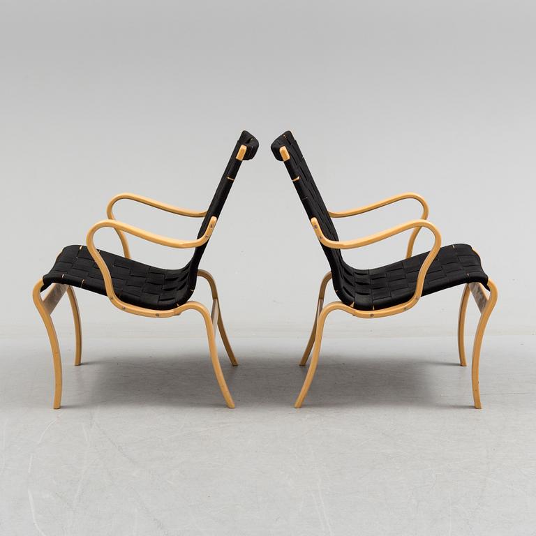 a pair of "Mina" armchairs by Bruno Matsson.